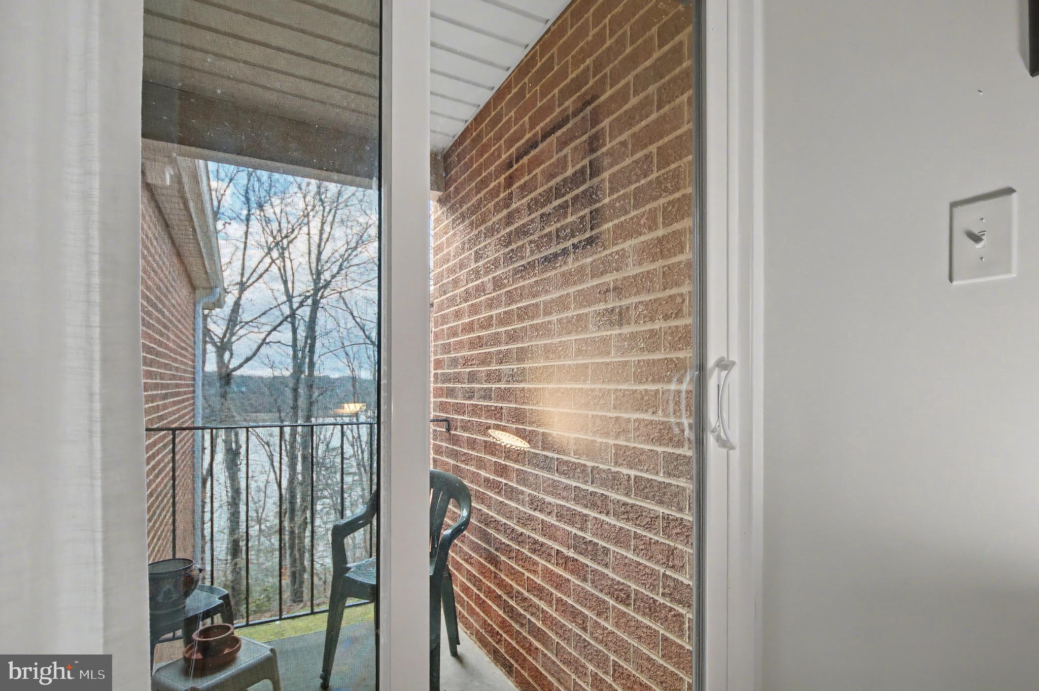 2900 Shipmaster Way, Unit 312 Annapolis, MD 21401 - Photo 19 of 56 a view of a door and a window