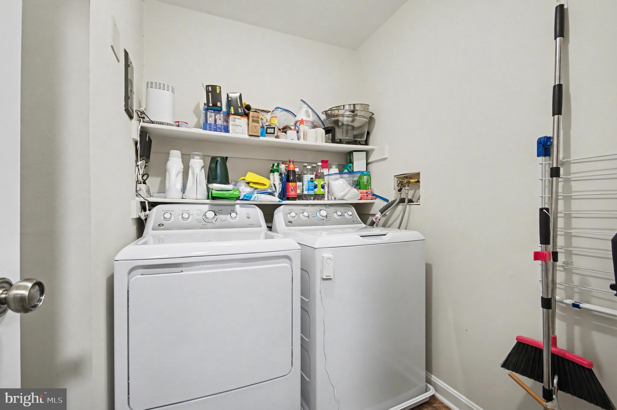 2900 Shipmaster Way, Unit 312 Annapolis, MD 21401 - Photo 36 of 56 a utility room with dryer and washer