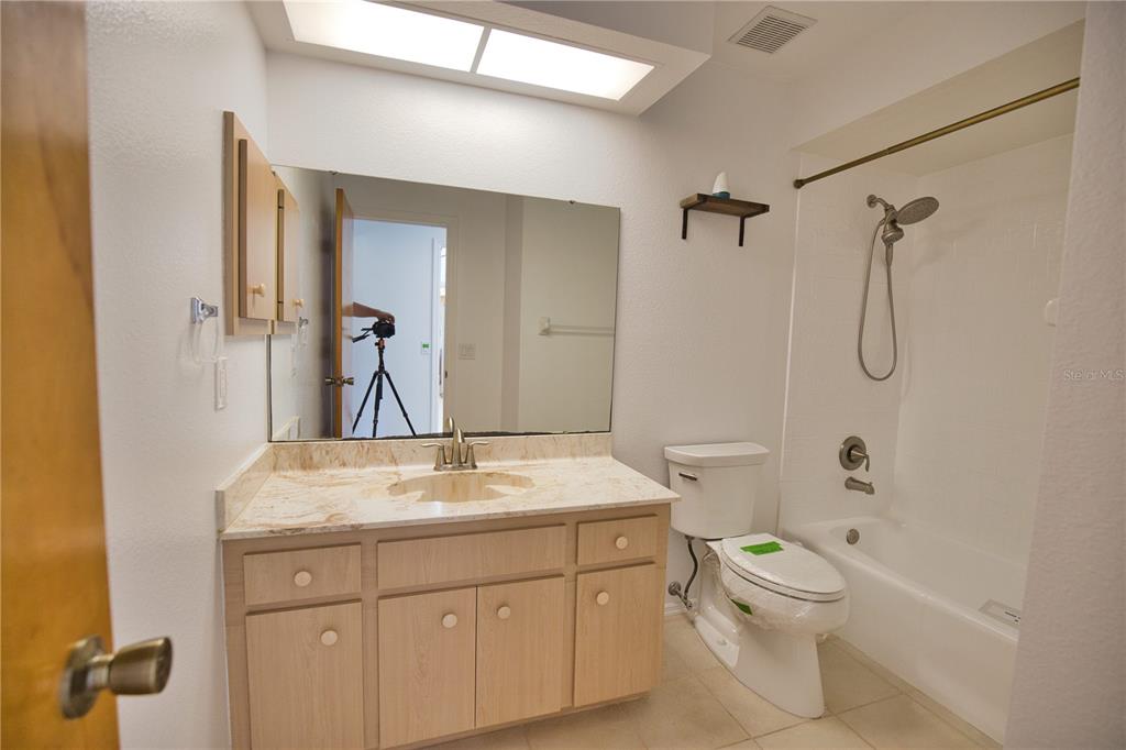 3534 Tundra Road Venice, FL 34293 - Photo 30 of 43 a bathroom with a sink a toilet and shower
