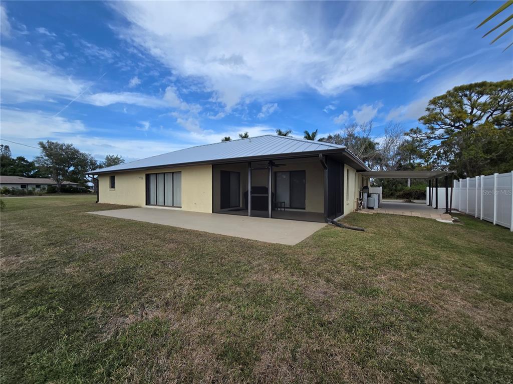 3534 Tundra Road Venice, FL 34293 - Photo 36 of 43 a view of a house with a yard