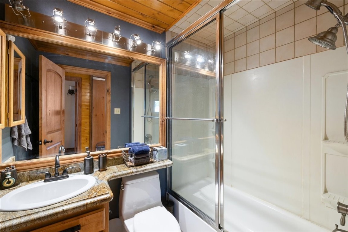 19 East Hanson Road Keystone, CO 80435 - Photo 17 of 24 a bathroom with a sink mirror and a shower