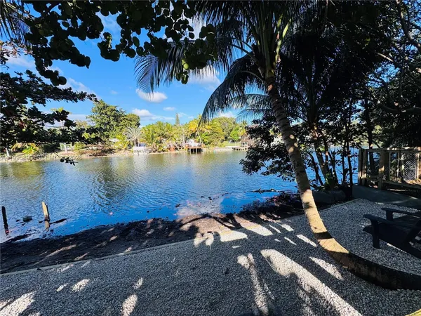 a view of a lake with houses