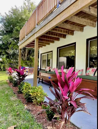 a view of yard with an outdoor seating