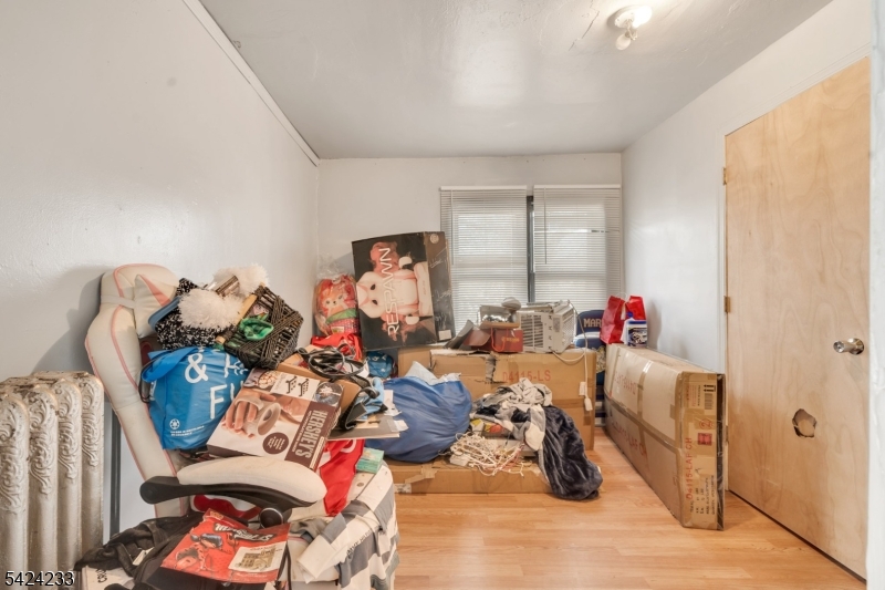 189 Scheerer Avenue Newark, NJ 07112 - Photo 18 of 30 a view of a livingroom with furniture and a living room