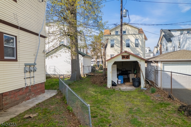 189 Scheerer Avenue Newark, NJ 07112 - Photo 23 of 30 a view of a house with backyard and porch