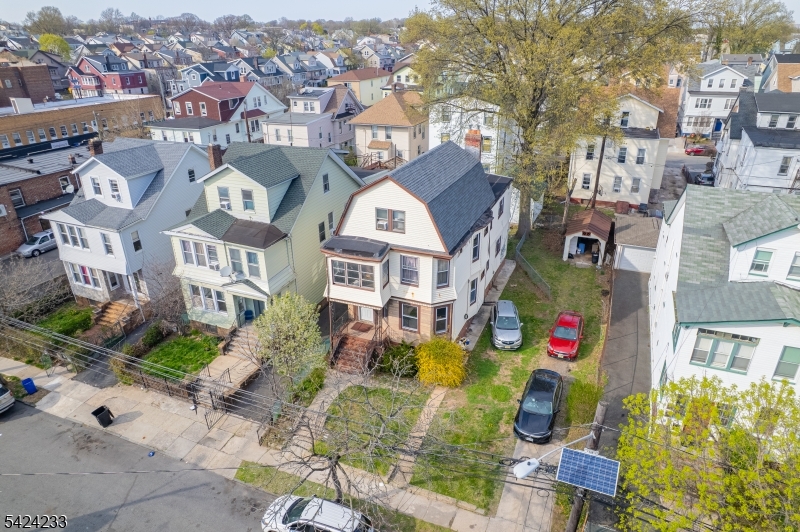 189 Scheerer Avenue Newark, NJ 07112 - Photo 27 of 30 an aerial view of residential houses with outdoor space and parking