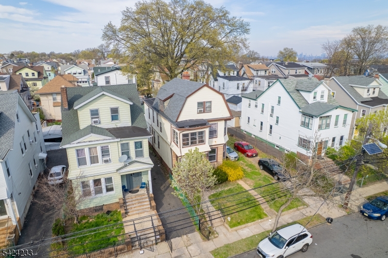 189 Scheerer Avenue Newark, NJ 07112 - Photo 29 of 30 an aerial view of a residential apartment building with a yard