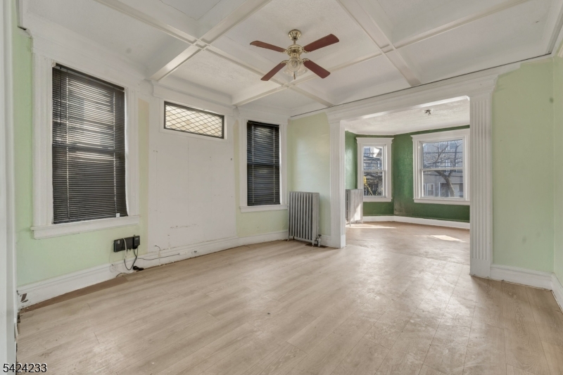 189 Scheerer Avenue Newark, NJ 07112 - Photo 3 of 30 a view of an empty room with a window