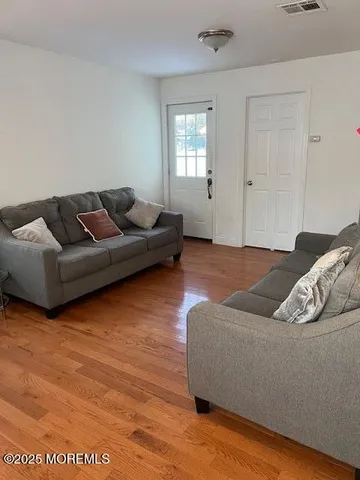 a living room with furniture and a couch