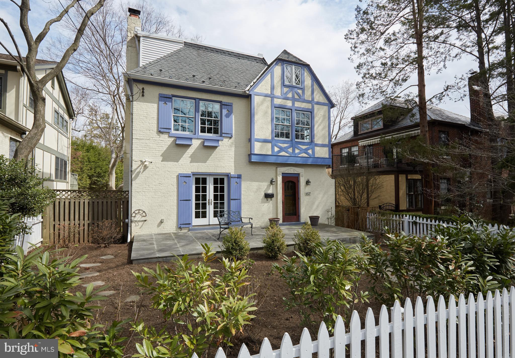 4327 Reno Road Northwest Washington, DC 20008 - Photo 2 of 29 white picket fence and landscaping