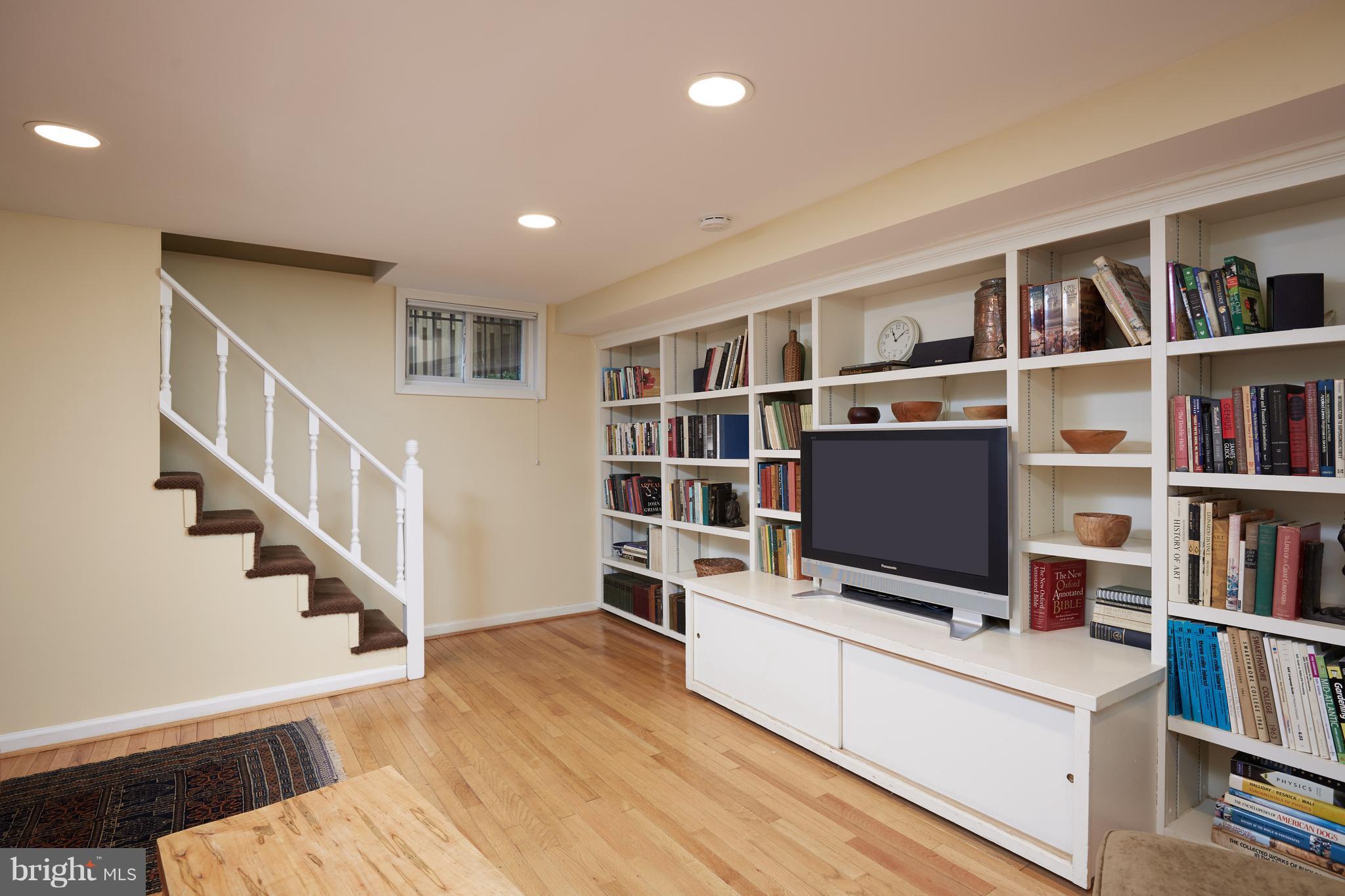 4327 Reno Road Northwest Washington, DC 20008 - Photo 23 of 29 Lower level w/ built-in bookcases