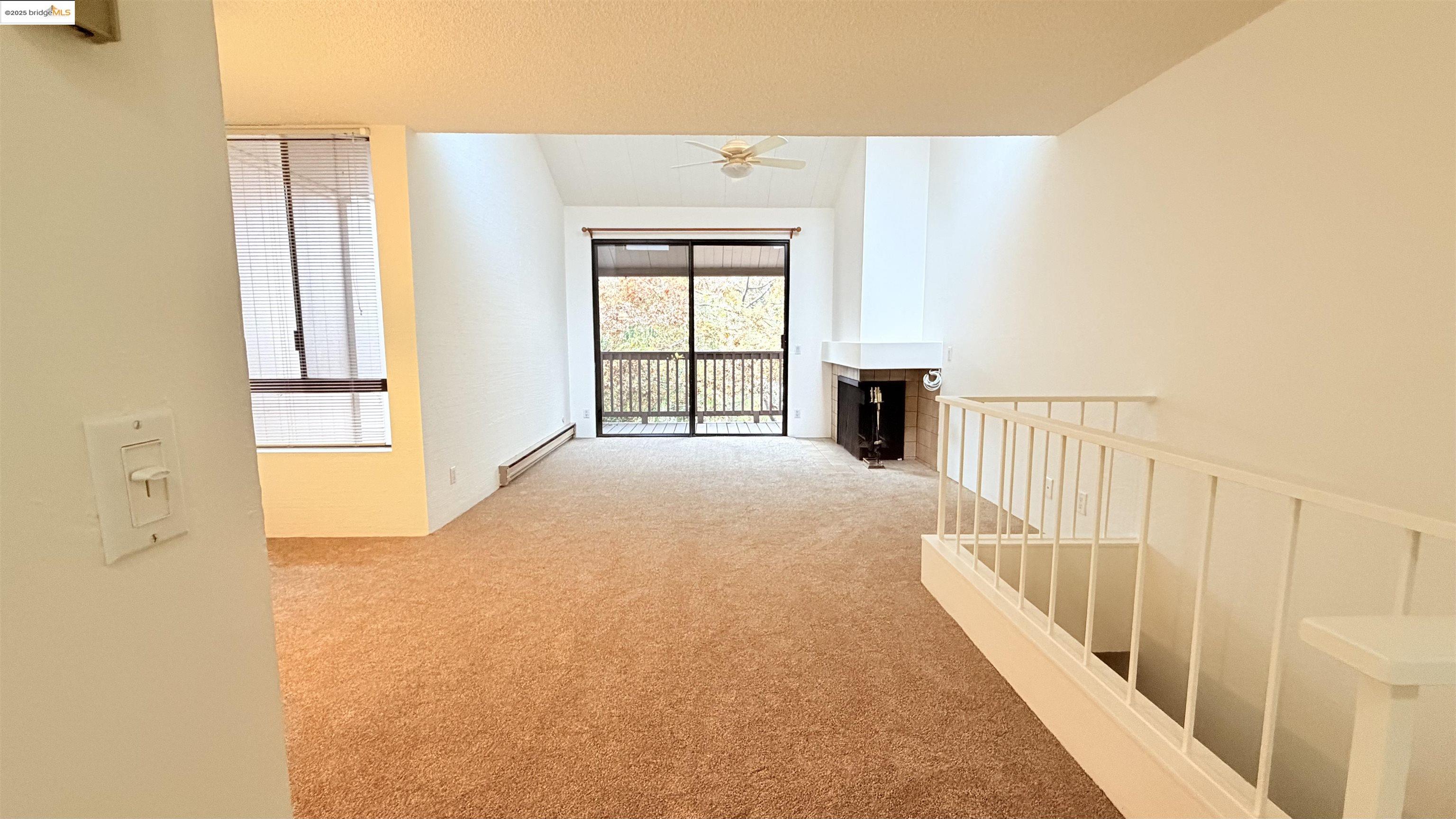 2101 Shore Line Drive, Unit 265 Alameda, CA 94501 - Photo 14 of 34 a view of a bedroom with wooden floor and windows