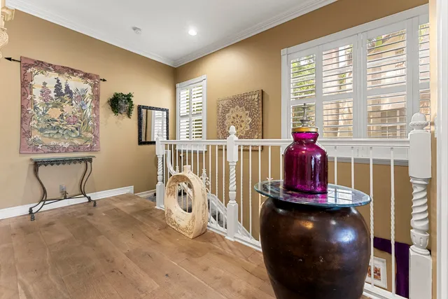 a view of a livingroom with furniture and a large window