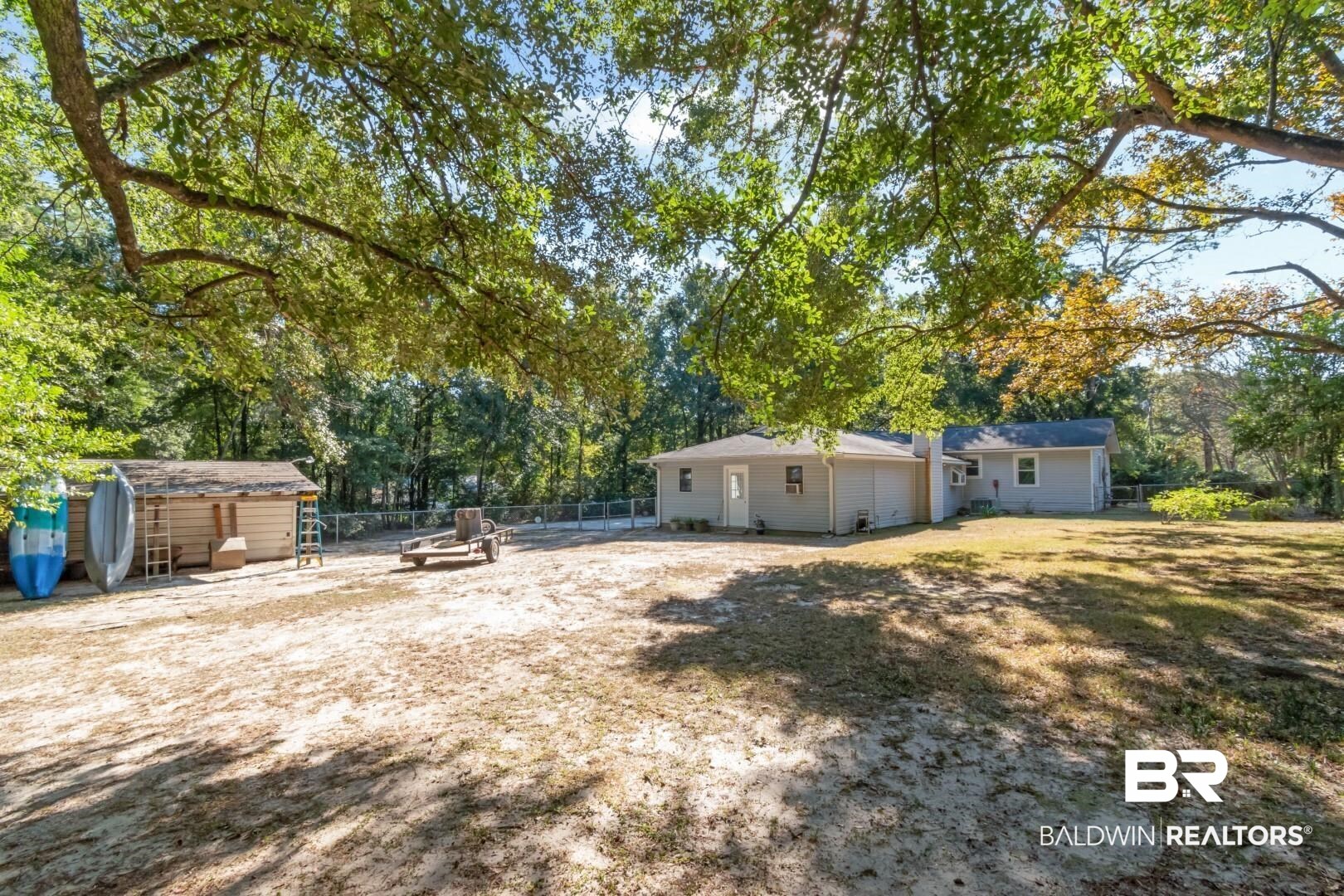 1321 Rainbow Drive West Mobile, AL 36693 - Photo 42 of 48 View of yard with a storage shed