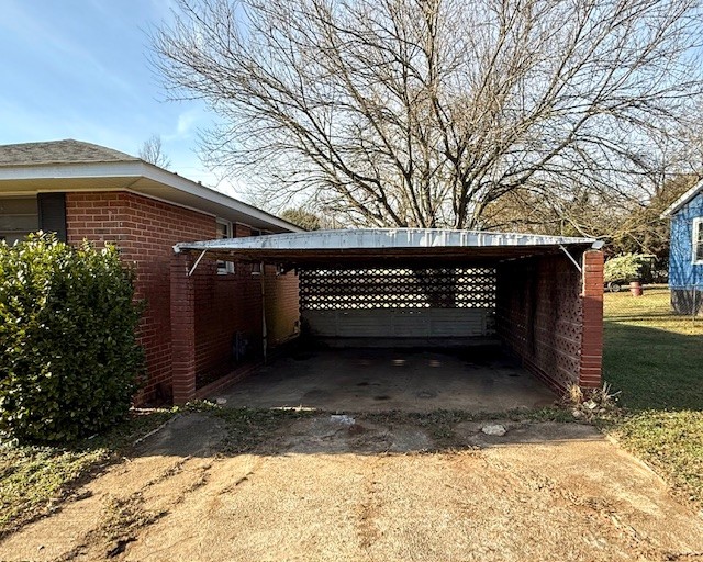 501 Corning Street Anderson, SC 29624 - Photo 3 of 9 This residence features a convenient carport, providing sheltered parking and easy access to the home.