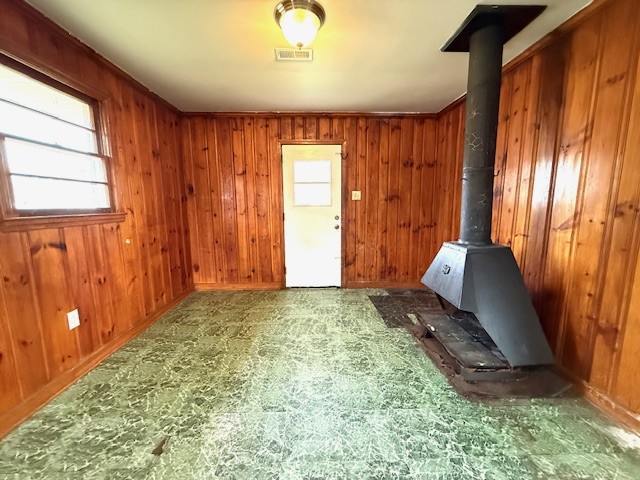 501 Corning Street Anderson, SC 29624 - Photo 7 of 9 Warm wood paneling and a unique fireplace create an inviting space.