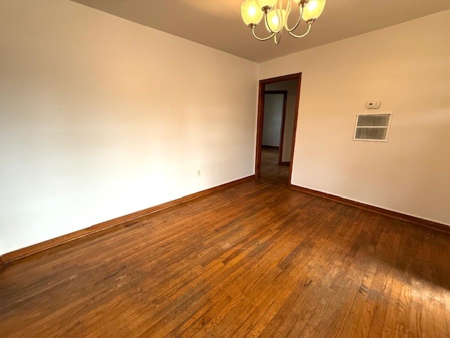 501 Corning Street Anderson, SC 29624 - Photo 9 of 9 This versatile space features rich hardwood floors, ready for personalized touches.