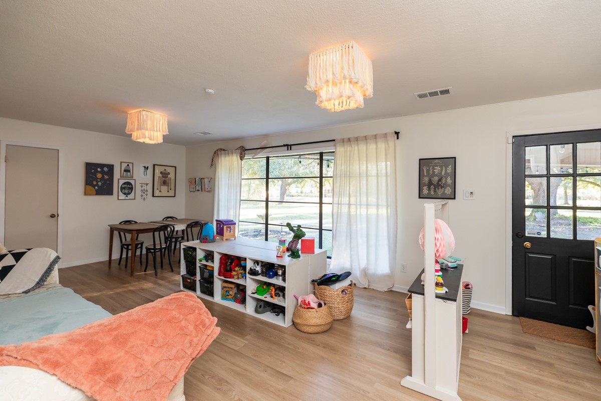 1210 Nottingham Lane Beaumont, TX 77706 - Photo 16 of 50 a living room with furniture and wooden floor