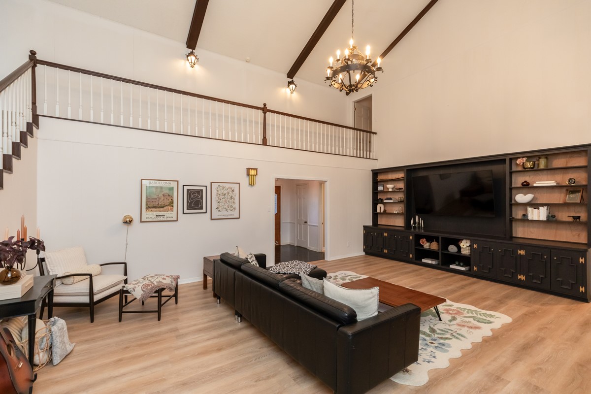 1210 Nottingham Lane Beaumont, TX 77706 - Photo 22 of 50 a living room with furniture and a flat screen tv