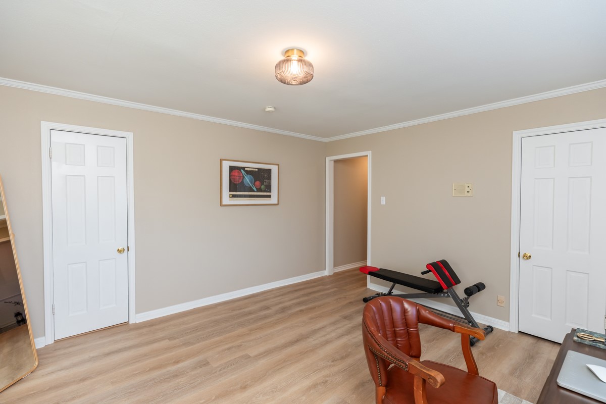1210 Nottingham Lane Beaumont, TX 77706 - Photo 32 of 50 a room with furniture and wooden floor