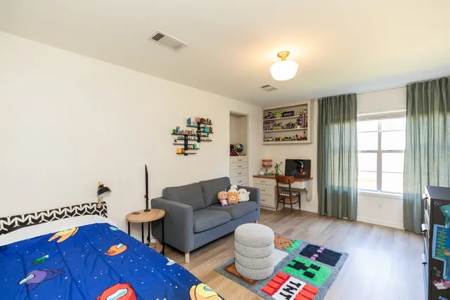 a living room with furniture and a couch