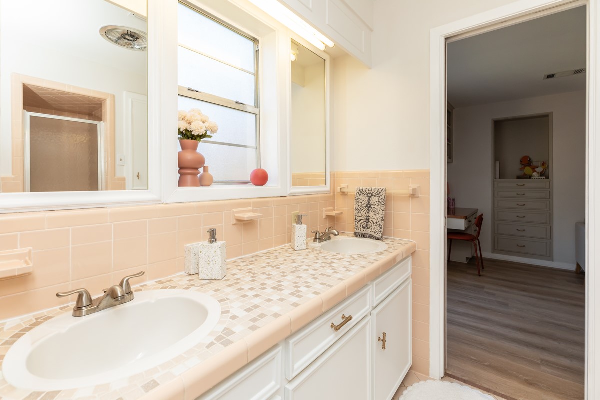 1210 Nottingham Lane Beaumont, TX 77706 - Photo 38 of 50 a bathroom with a granite countertop sink and a mirror