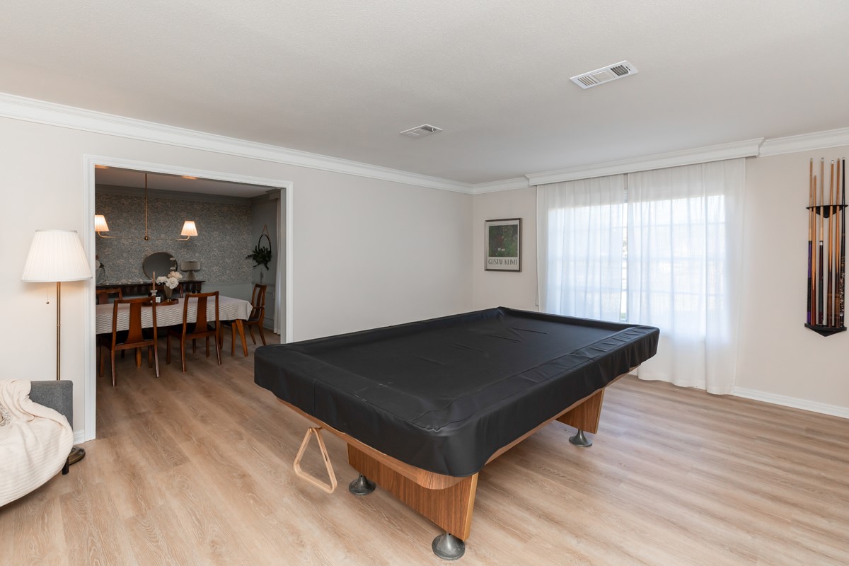 1210 Nottingham Lane Beaumont, TX 77706 - Photo 4 of 50 a living room with a table chairs and a window