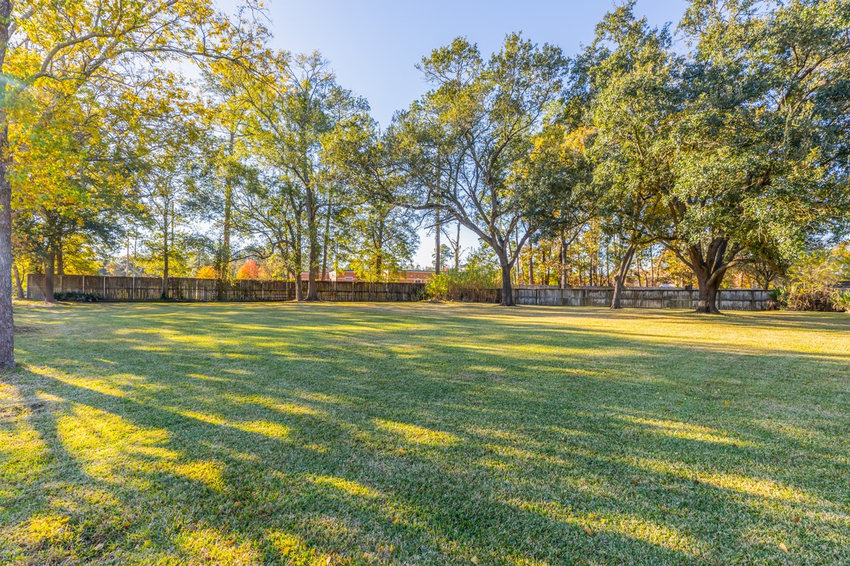 1210 Nottingham Lane Beaumont, TX 77706 - Photo 48 of 50 a view of swimming pool with trees