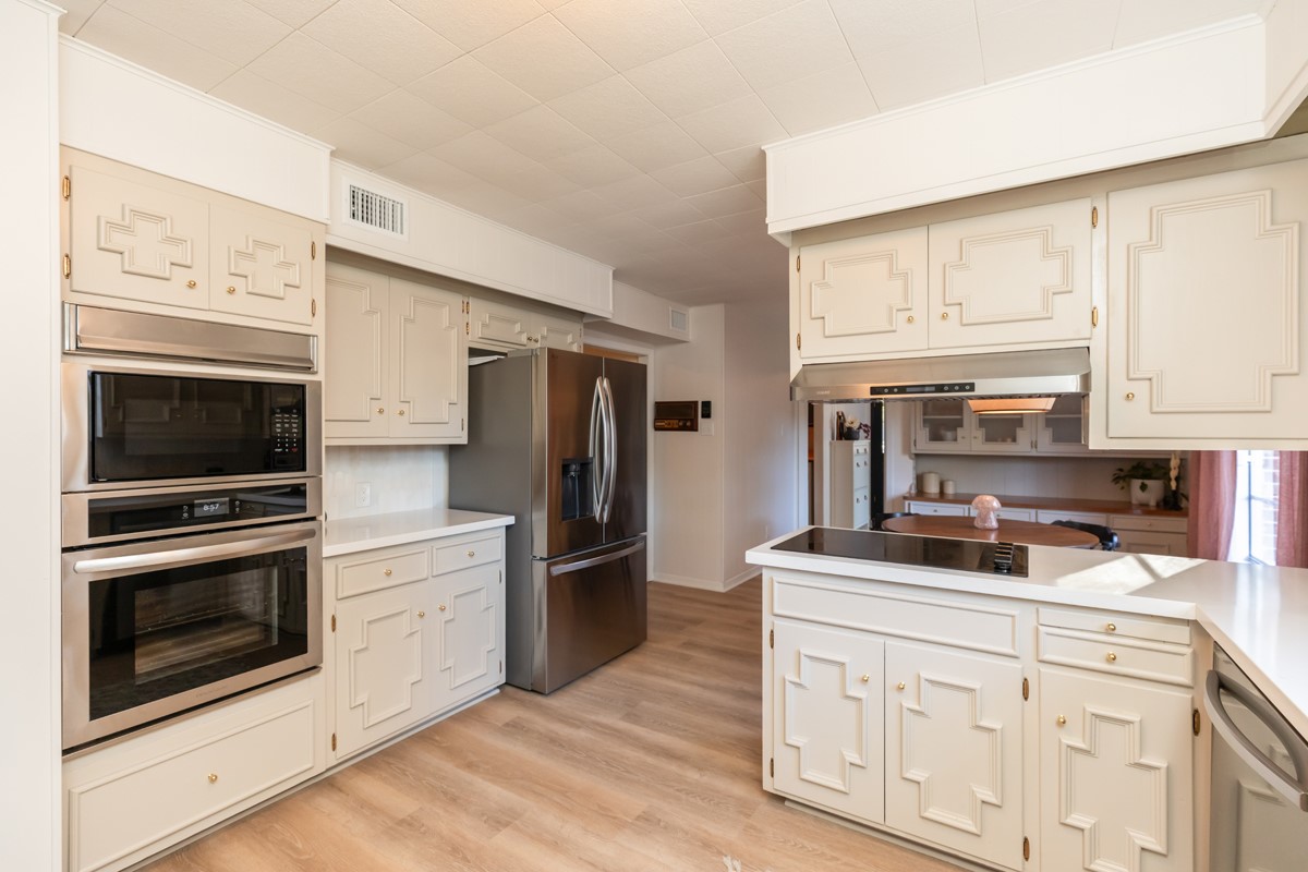 1210 Nottingham Lane Beaumont, TX 77706 - Photo 7 of 50 a kitchen with granite countertop cabinets stainless steel appliances and a counter space