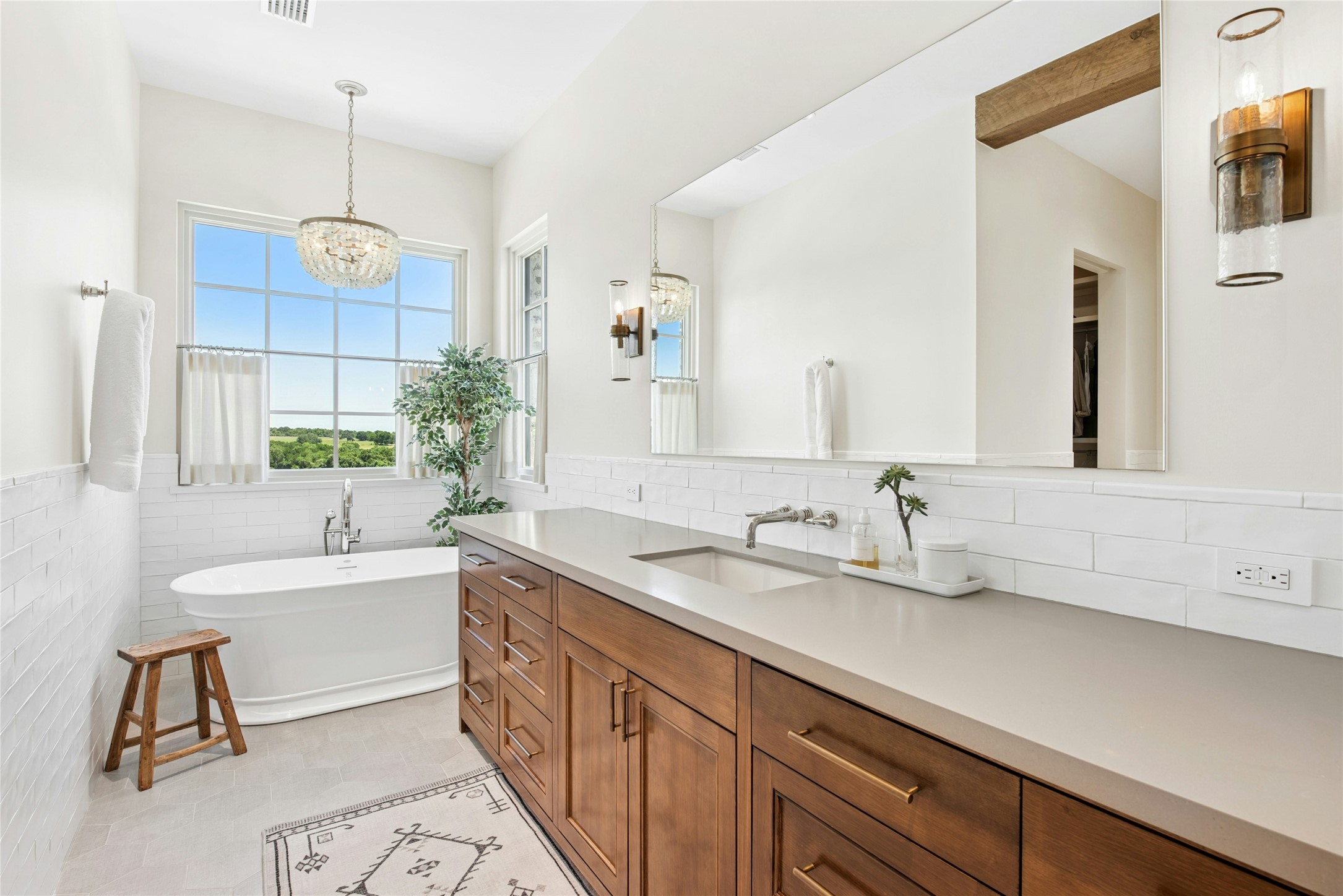658 Fordtran Road New Ulm, TX 78950 - Photo 22 of 50 a bathroom with a sink and a mirror