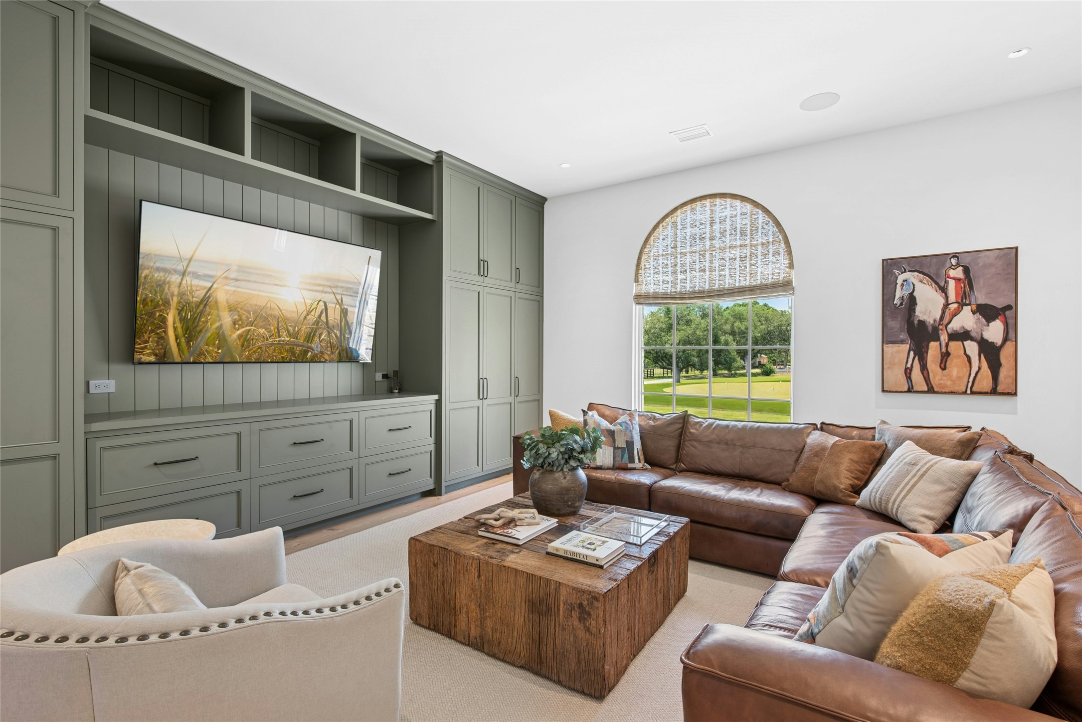 658 Fordtran Road New Ulm, TX 78950 - Photo 27 of 50 a living room with furniture and a flat screen tv