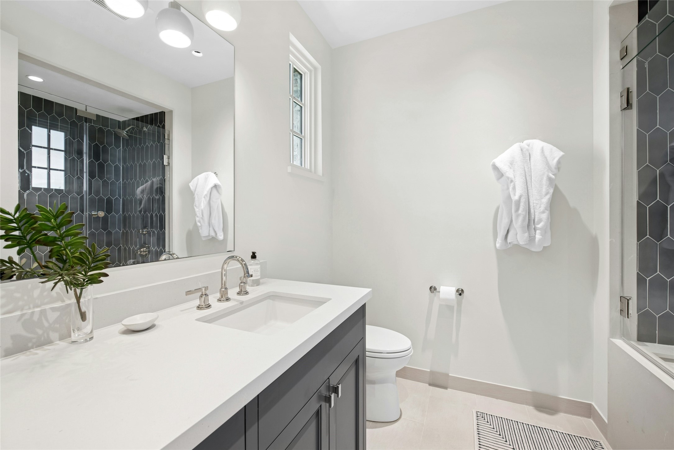 658 Fordtran Road New Ulm, TX 78950 - Photo 31 of 50 a bathroom with a sink toilet and shower