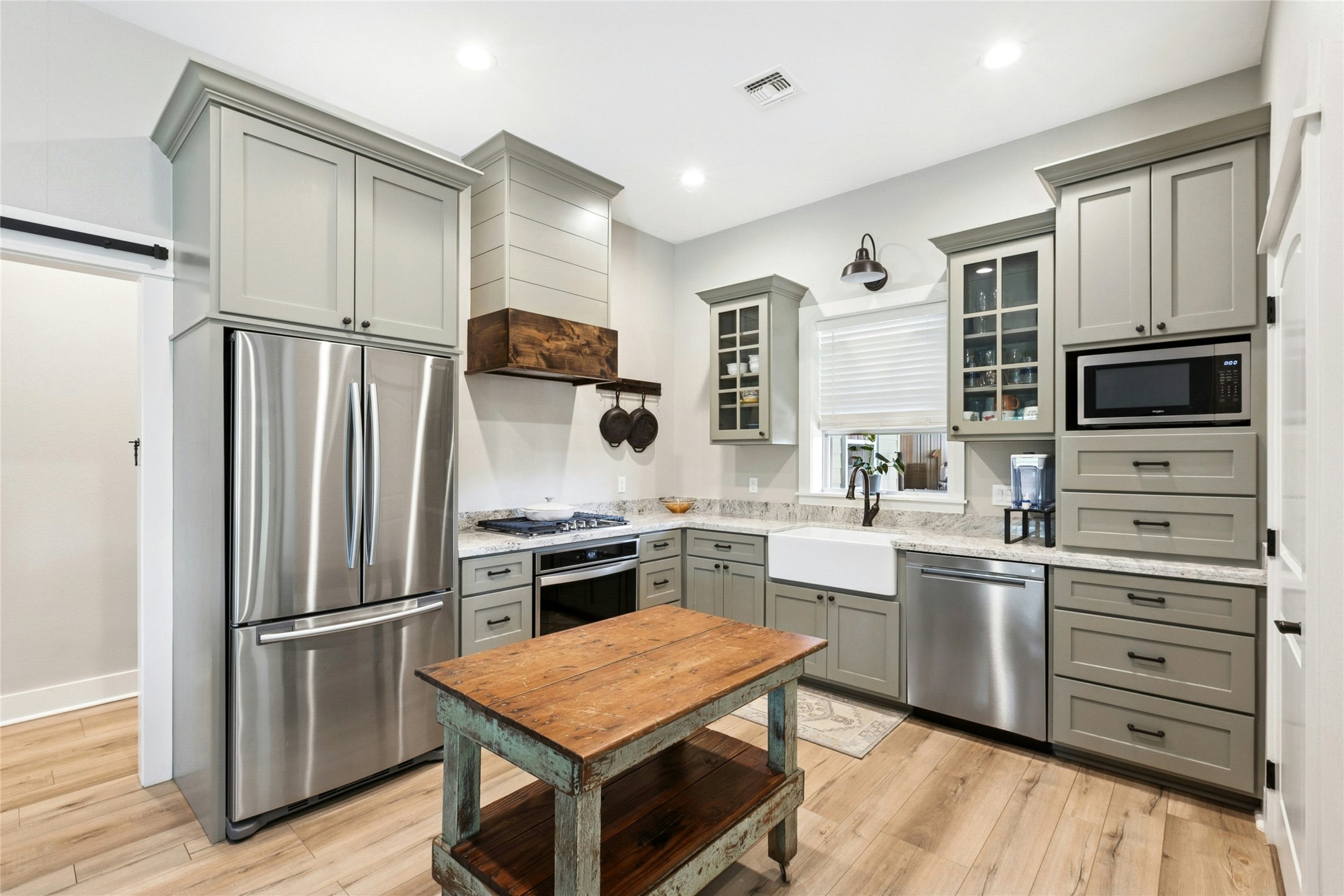 658 Fordtran Road New Ulm, TX 78950 - Photo 41 of 50 a kitchen with a refrigerator stove and sink