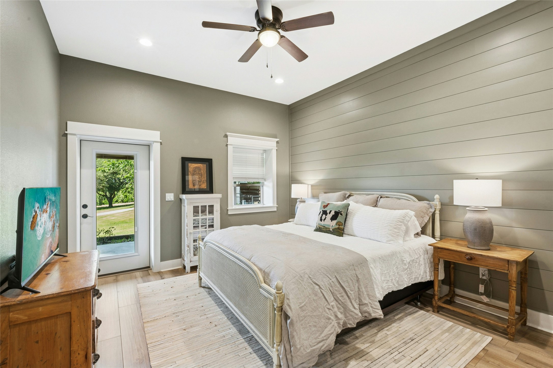 658 Fordtran Road New Ulm, TX 78950 - Photo 42 of 50 a bedroom with a bed and a flat screen tv