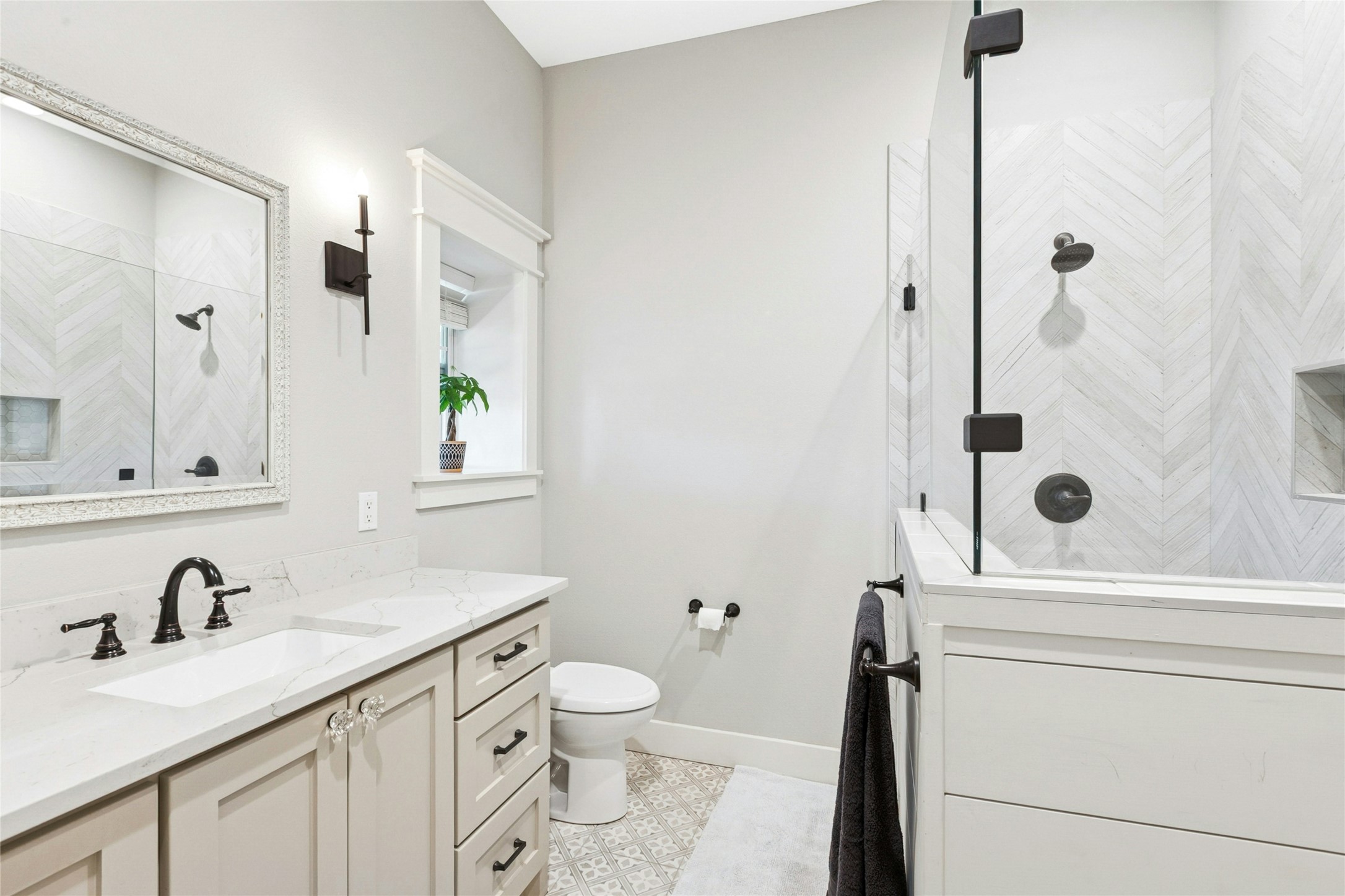 658 Fordtran Road New Ulm, TX 78950 - Photo 43 of 50 a bathroom with a sink a toilet and shower
