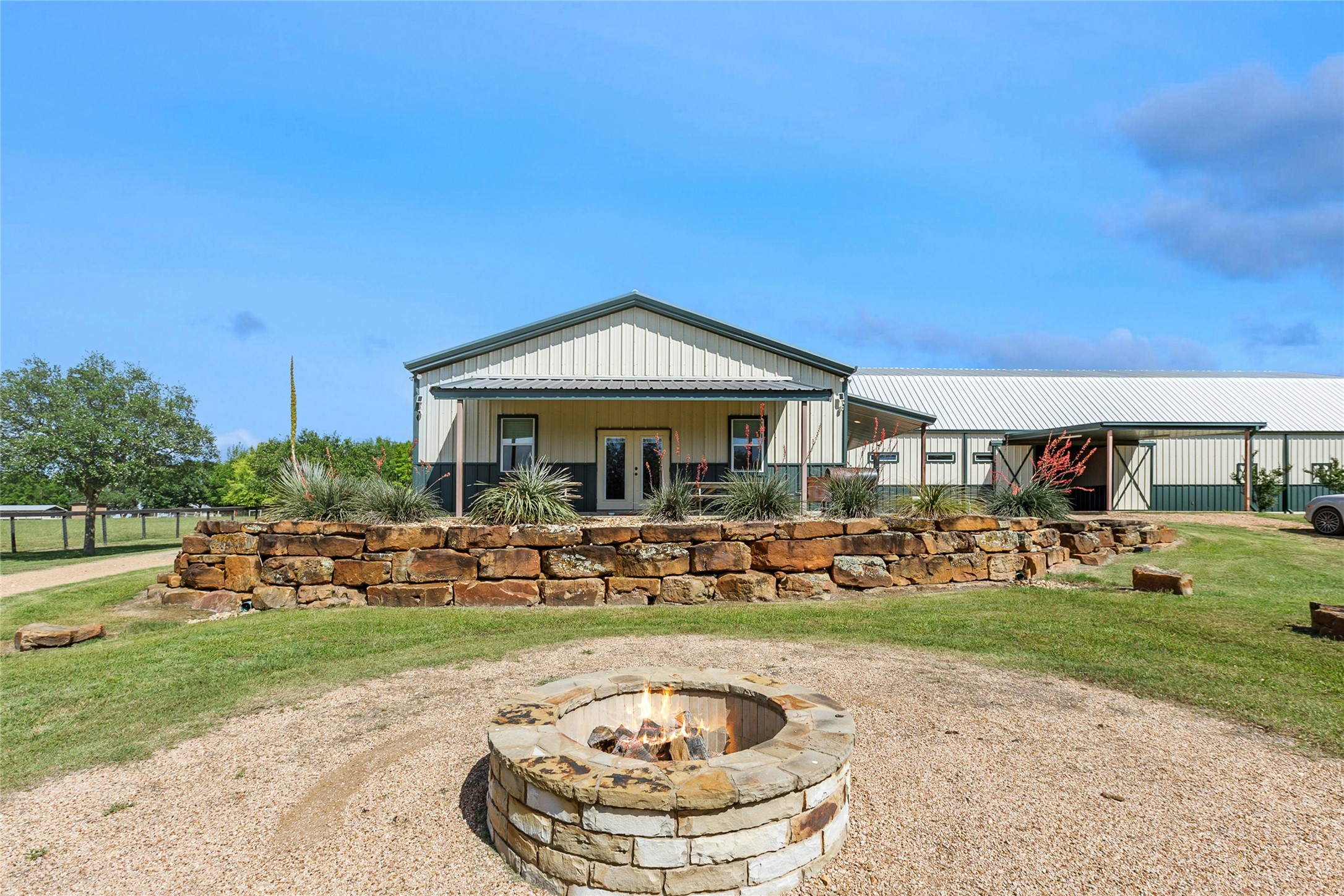 658 Fordtran Road New Ulm, TX 78950 - Photo 44 of 50 a front view of a house with garden