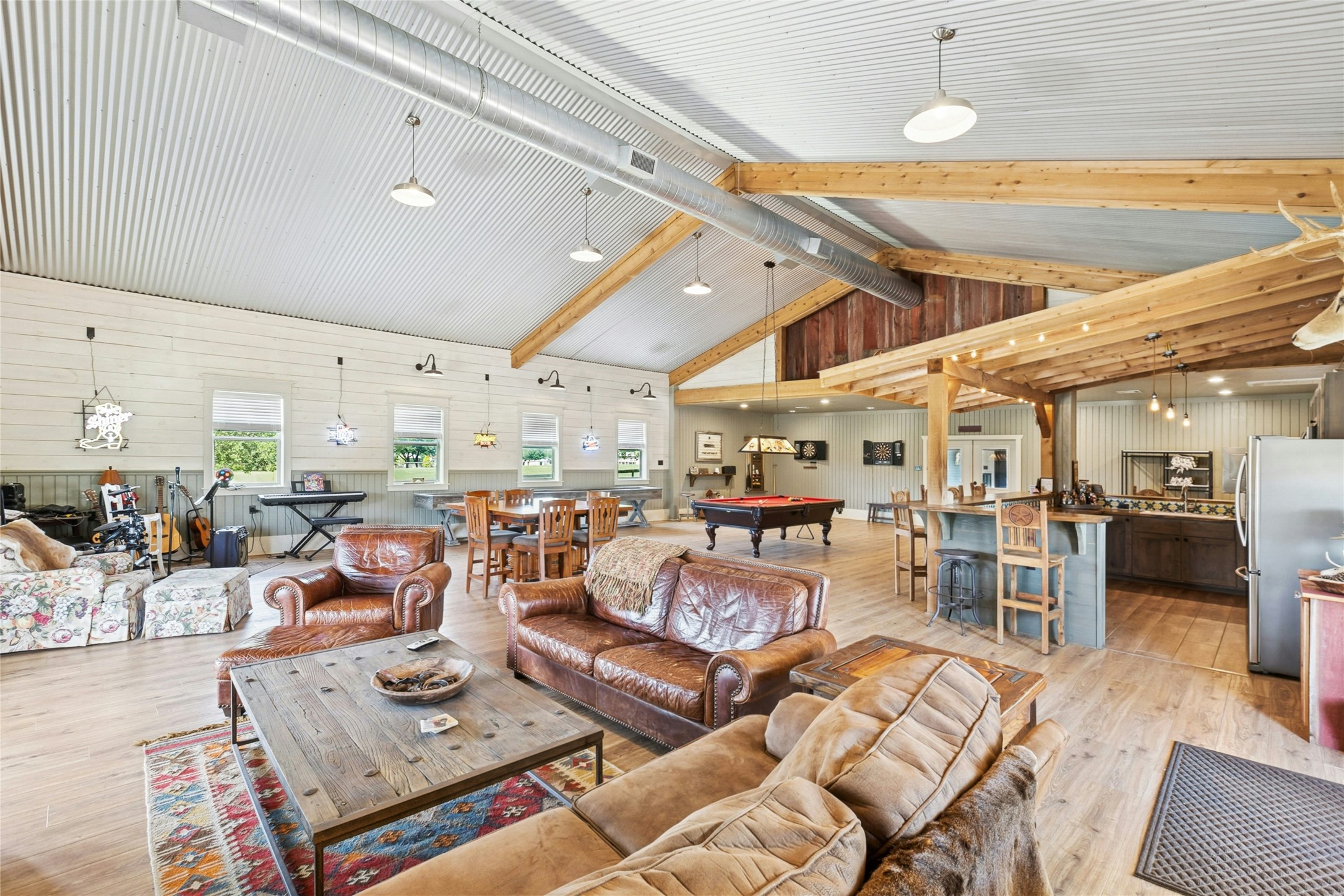 658 Fordtran Road New Ulm, TX 78950 - Photo 45 of 50 a living room with lots of furniture and view of kitchen