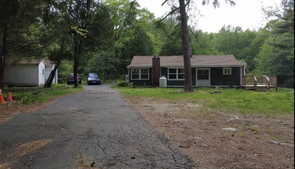 32 Hollow Road Wales, MA 01081 - Photo 26 of 35 a front view of a house with garden