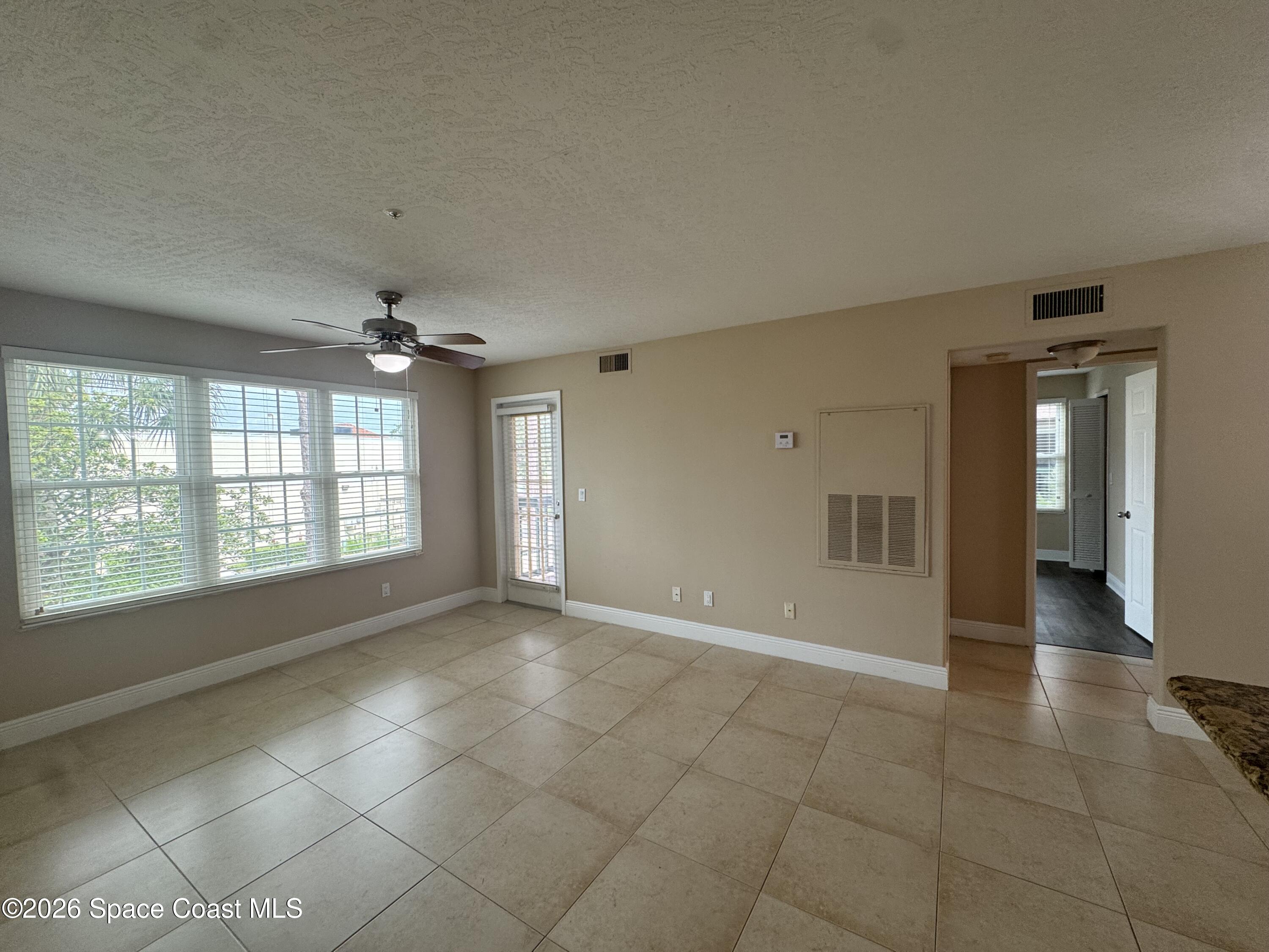 7667 North Wickham Road, Unit 416 Melbourne, FL 32940 - Photo 4 of 23 IMG_7231