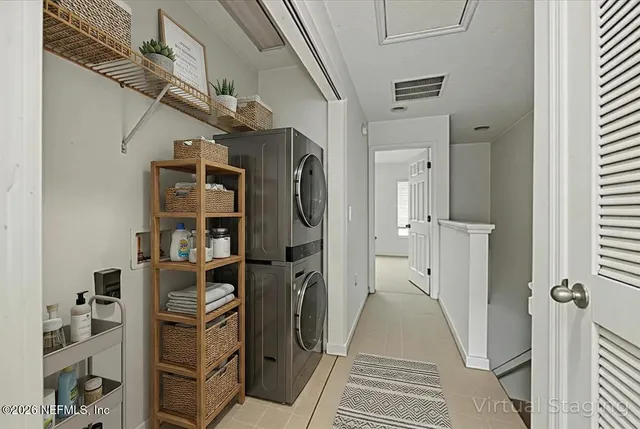a bathroom with a granite countertop toilet sink and mirror