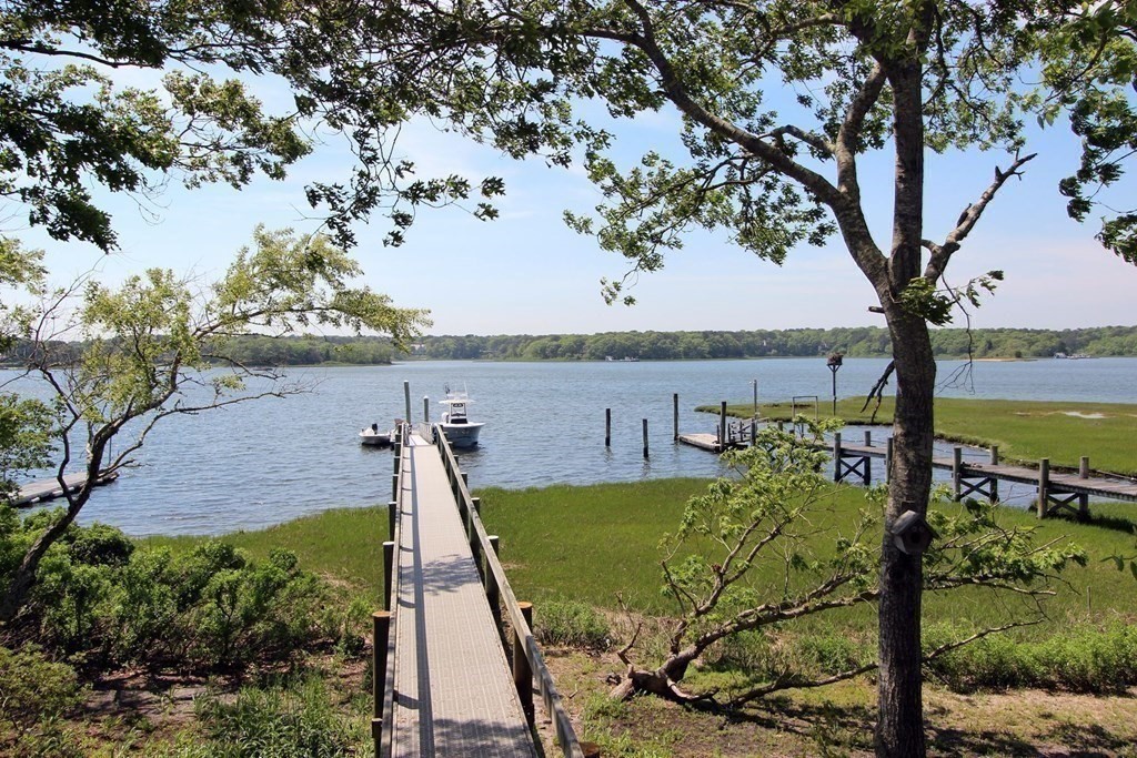 99 Monomoscoy Road West Mashpee, MA 02649 - Photo 17 of 40 a view of a garden