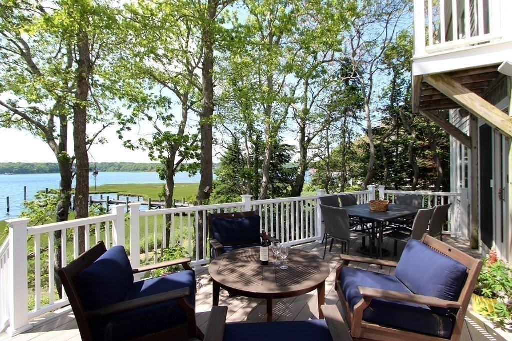 99 Monomoscoy Road West Mashpee, MA 02649 - Photo 18 of 40 a view of a patio on the deck