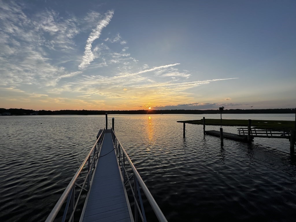 99 Monomoscoy Road West Mashpee, MA 02649 - Photo 38 of 40 a view of a ocean from a balcony