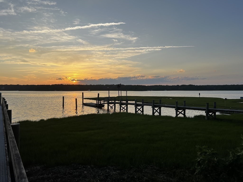 99 Monomoscoy Road West Mashpee, MA 02649 - Photo 40 of 40 a view of a lake from yard