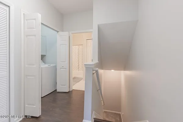 a bedroom with a bed and ceiling fan