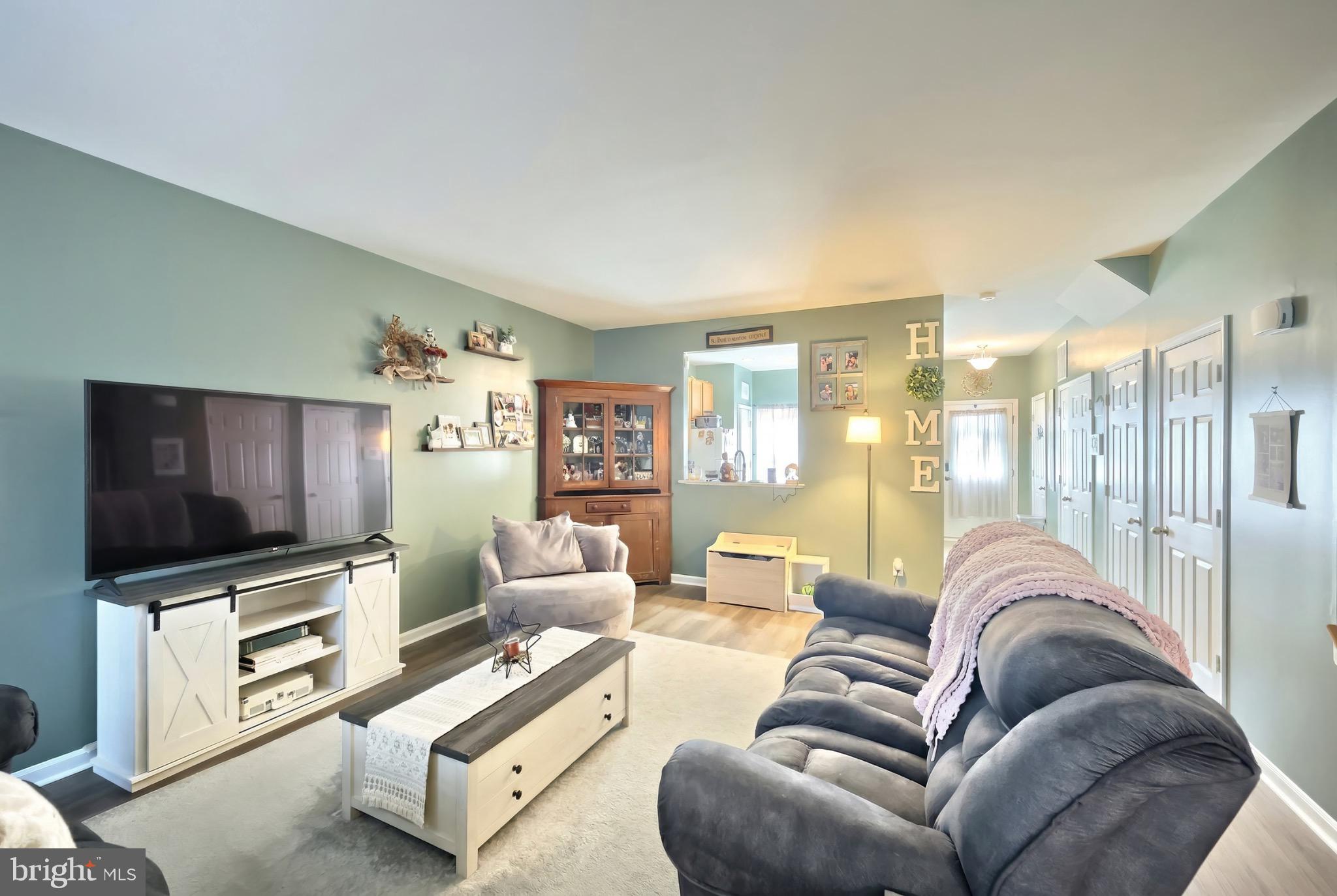 712 Spencer Drive Hanover, PA 17331 - Photo 11 of 23 a living room with furniture and a flat screen tv