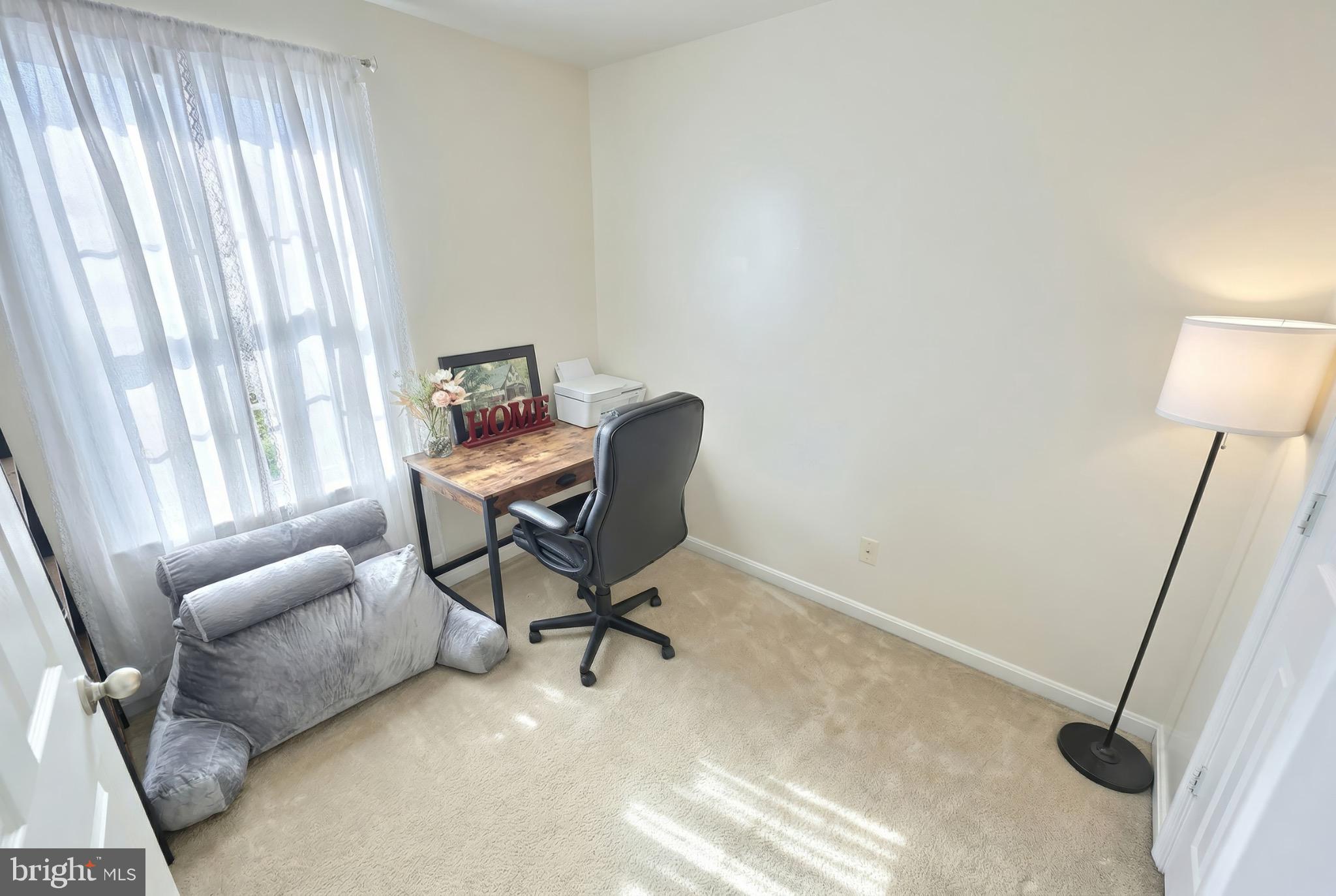 712 Spencer Drive Hanover, PA 17331 - Photo 14 of 23 a view of a workspace with furniture and a window