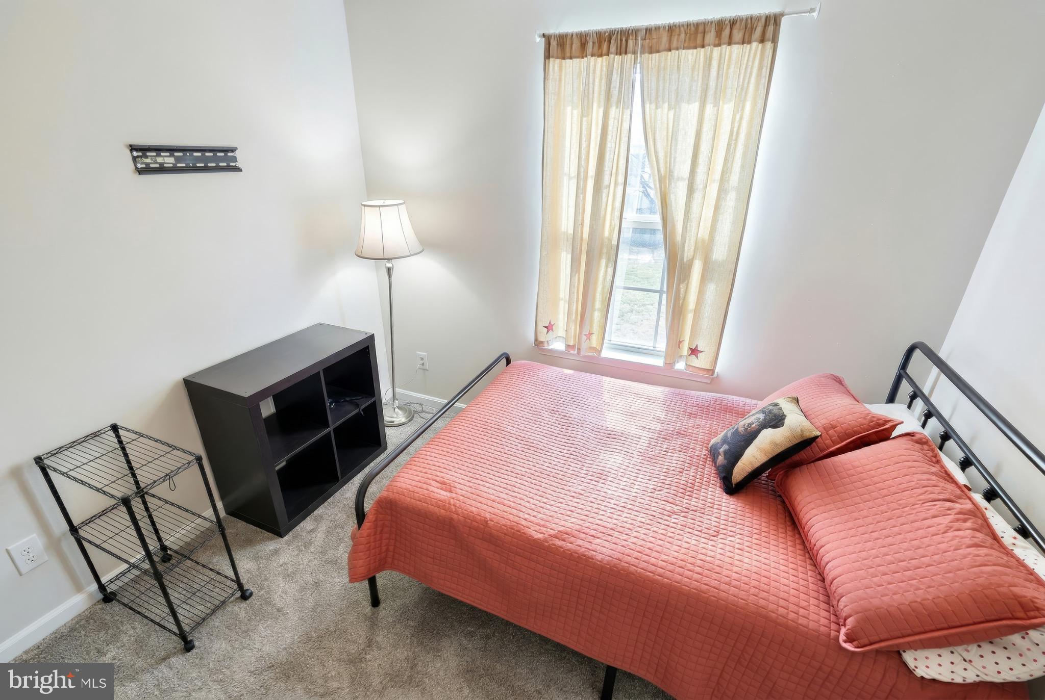 712 Spencer Drive Hanover, PA 17331 - Photo 15 of 23 a bedroom with a bed and a lamp