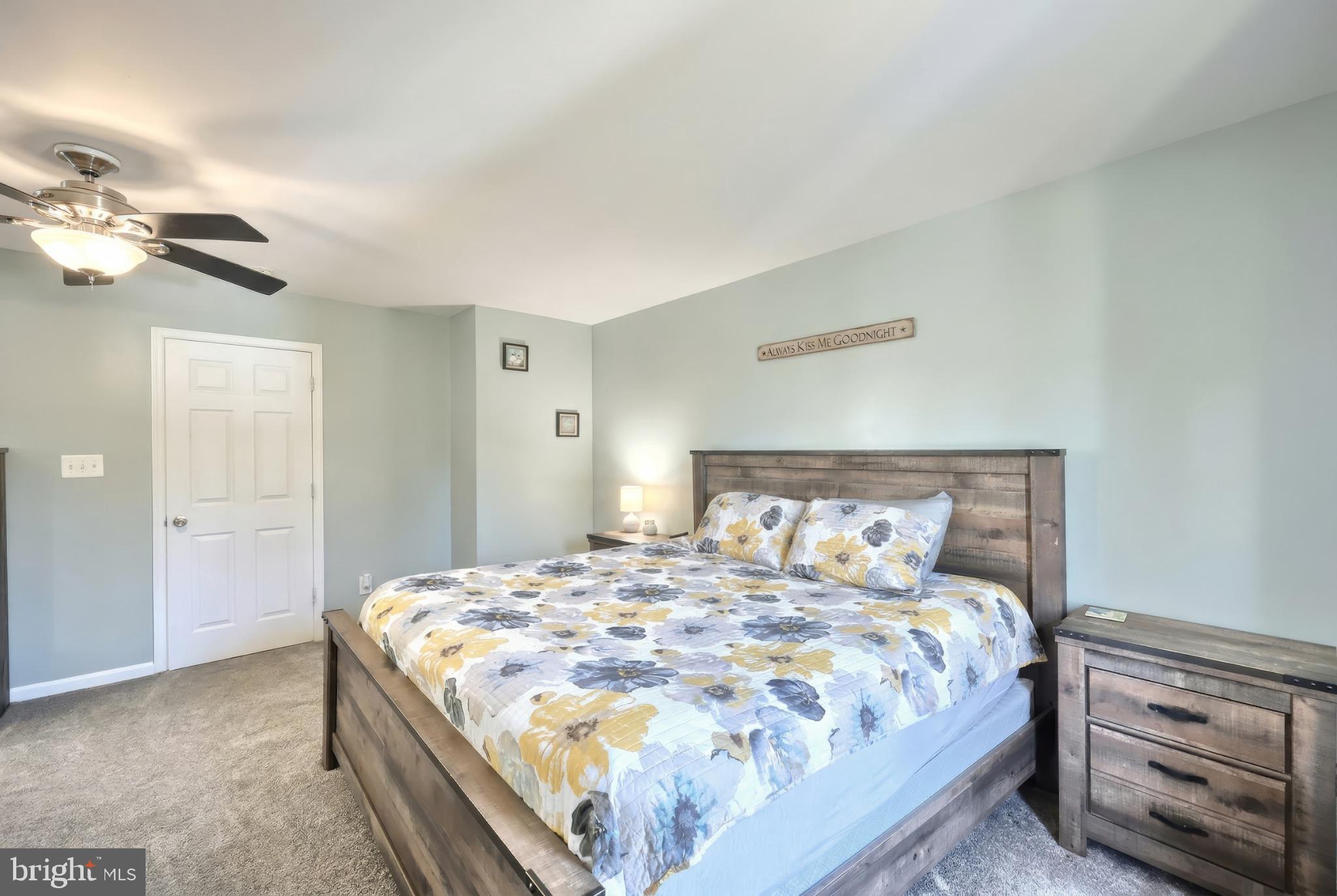 712 Spencer Drive Hanover, PA 17331 - Photo 20 of 23 a bedroom with a bed and a chandelier