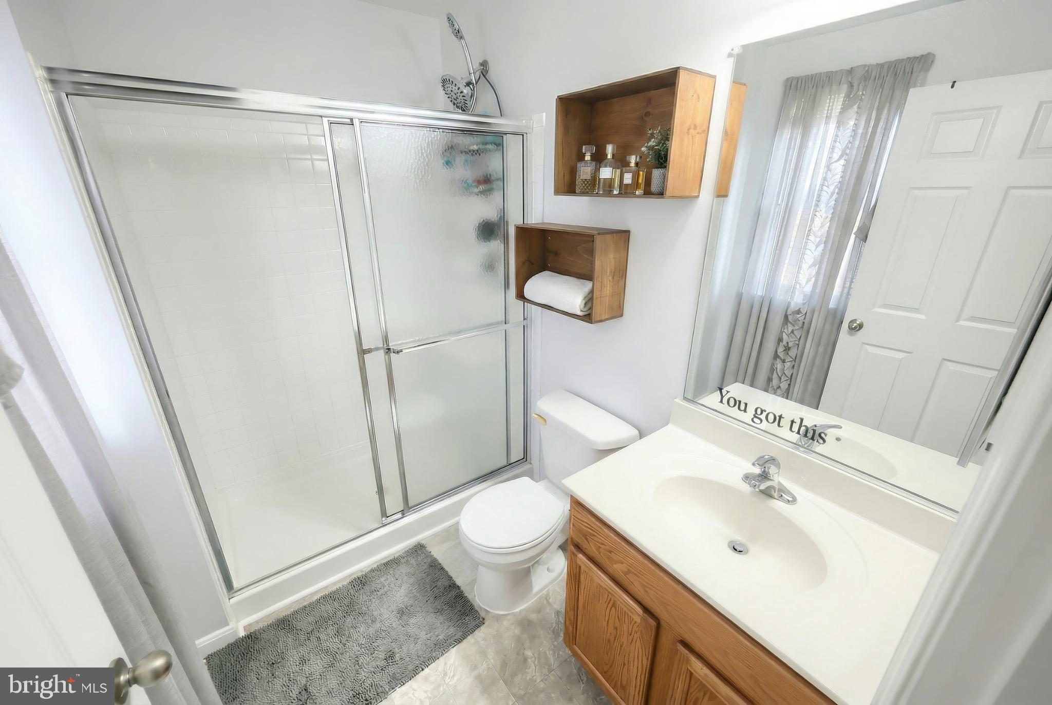 712 Spencer Drive Hanover, PA 17331 - Photo 21 of 23 a bathroom with a sink toilet and shower